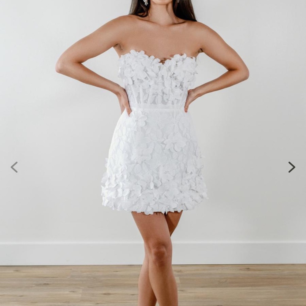 Cosmos by watter little white dress